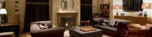 Log fire An Cos luxury holiday lodge, Scottish highlands